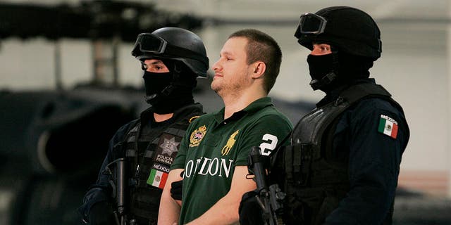 Edgar "La Barbie" Valdez Villarreal is shown to the press during a news conference at the federal police center Aug. 31, 2010 in Mexico City. Valdez, a Texas-born drug smuggler and leader in the Beltran Leyva Cartel, was captured Aug. 30 by Mexican authorities in a residential area near Mexico City.