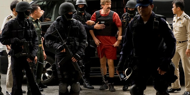 Russian arms dealer Viktor Bout arrives at a Criminal Court in Bangkok on October 5, 2010. 