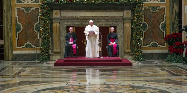 Pope Francis exchanges Christmas greetings with the Roman Curia at the Clementina Hall in Vatican City on Dec. 21, 2018.