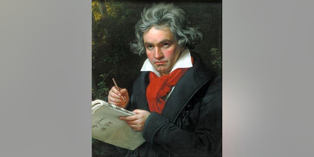 German composer Ludwig van Beethoven (1770 - 1827) composing the 'Missa Solemnis', February-April 1820. Oil painting by August Klober. 