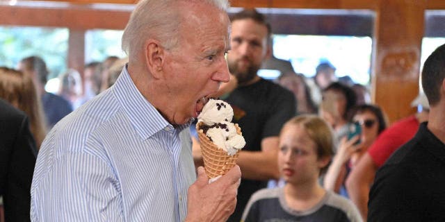 President Joe Biden eats ice cream in Traverse City, Michigan, on July 3, 2021.