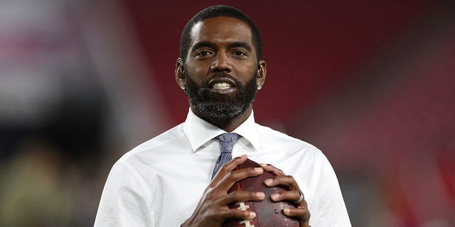 Football: ESPN analyst Randy Moss on field before Tampa Bay Buccaneers vs. New York Giants game at Raymond James Stadium. Tampa, FL 