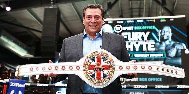 WBC president Mauricio Sulaiman poses with Union championship belt during the Tyson Fury & Dillian Whyte Media Work Out at Wembley Park on April 19, 2022 in London.