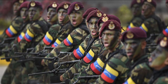 Soldiers march during the country's Independence Day parade in Caracas, Venezuela, on Tuesday, July 5, 2022.
