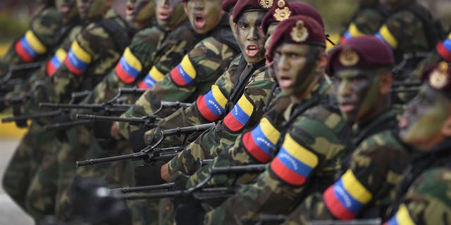 Soldiers march during the country's Independence Day parade in Caracas, Venezuela, on Tuesday, July 5, 2022.