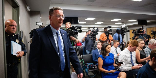 Greenwood Mayor Mark W. Myers enters a press conference in the Greenwood City Center Council Chambers on July 18, 2022, in Greenwood, Indiana. 