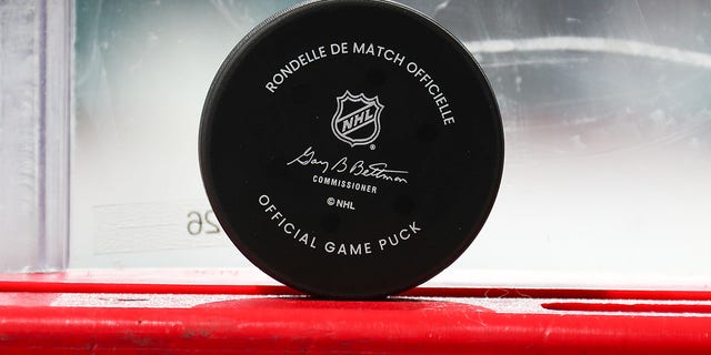 An official game puck with the NHL logo on Oct. 22, 2022, at the Prudential Center in Newark, New Jersey.