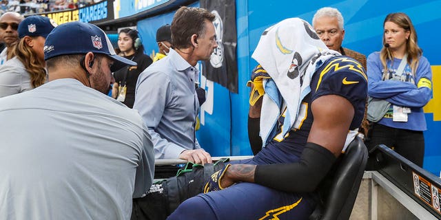 Los Angeles Chargers cornerback J.C. Jackson is carted off the field after injuring his knee against the Seattle Seahawks at SoFi Stadium on Oct. 23, 2022.