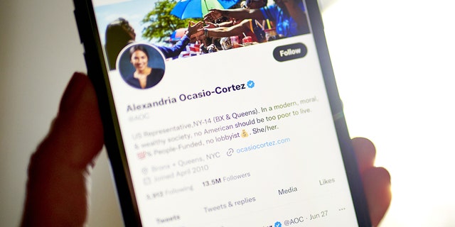 A blue verification check on the page of Representative Alexandria Ocasio-Cortez, a Democrat from New York, in the Brooklyn borough of New York, US, on Monday, Nov. 7, 2022. 