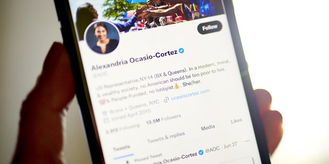 A blue verification check on the page of Representative Alexandria Ocasio-Cortez, a Democrat from New York, in the Brooklyn borough of New York, US, on Monday, Nov. 7, 2022. 