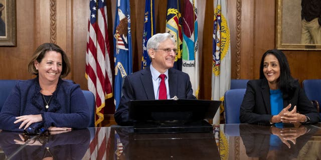 Lisa Monaco, deputy attorney general, left, Attorney General Merrick Garland and Vanita Gupta, associate attorney general, during a news conference at the Department of Justice in Washington, D.C., on Nov. 30, 2022.