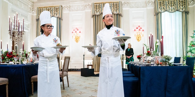 WASHINGTON, DC  November 30, 2022: White House Executive Chef Cris Comerford and White House Executive Pastry Chef Susie Morrison present the dishes on the menu during the media preview of the state dinner for the President of France in the State Dining Room of the White House on Wednesday November 30, 2022.