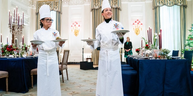 WASHINGTON, DC  November 30, 2022: White House Executive Chef Cris Comerford and White House Executive Pastry Chef Susie Morrison present the dishes on the menu during the media preview of the state dinner for the President of France in the State Dining Room of the White House on Wednesday November 30, 2022.