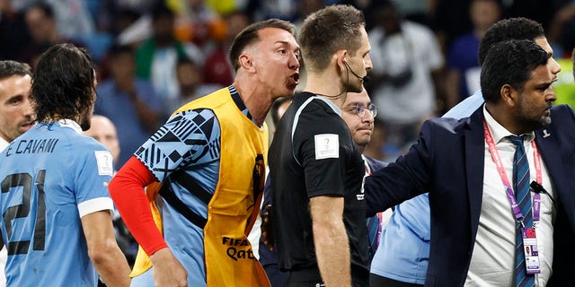 Uruguay goalkeeper Fernando Muslera remonstrates with German referee Daniel Siebert at the end of the Qatar 2022 World Cup Group H match between Ghana and Uruguay at the Al-Janoub Stadium in Al-Wakrah, Qatar, on Friday.