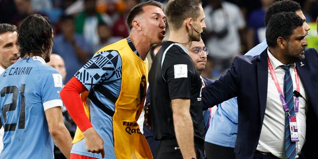 Uruguay goalkeeper Fernando Muslera remonstrates with German referee Daniel Siebert at the end of the Qatar 2022 World Cup Group H match between Ghana and Uruguay at the Al-Janoub Stadium in Al-Wakrah, Qatar, on Friday.