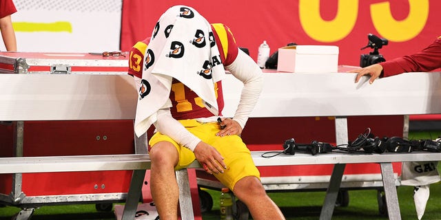 USC Trojans quarterback Caleb Williams is dejected on the bench after the Pac-12 Conference championship game between the Utah Utes and the USC Trojans at Allegiant Stadium on December 2, 2022 in Las Vegas, Nevada.