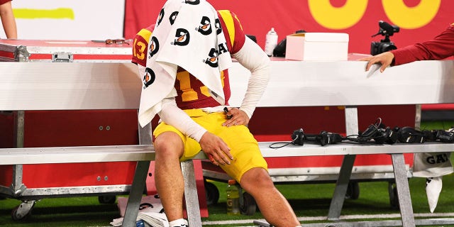 USC Trojans quarterback Caleb Williams is dejected on the bench after the Pac-12 Conference championship game between the Utah Utes and the USC Trojans at Allegiant Stadium on December 2, 2022 in Las Vegas, Nevada.