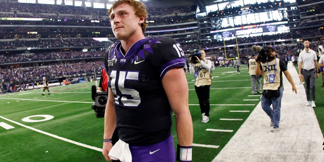 Max Duggan of the TCU Horned Frogs walks off the field following the teams 31-28 overtime loss to the Kansas State Wildcats in the Big 12 Football Championship on December 3, 2022 in Arlington, Texas.