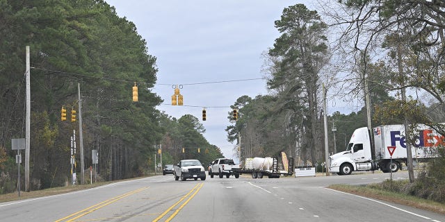 Unlit traffic lights are seen as tens of thousands are without power on Moore County, North Carolina, after an attack at two substations. 