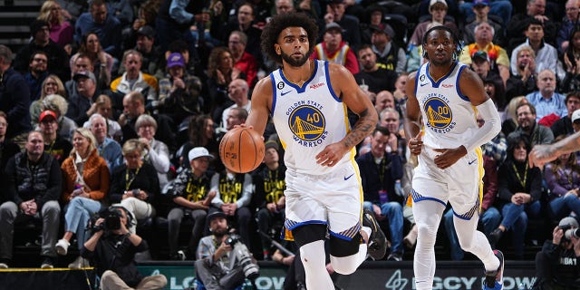 Anthony Lamb, #40 of the Golden State Warriors, dribbles the ball during the game against the Utah Jazz on Dec. 7, 2022 at Vivint SmartHome Arena in Salt Lake City.