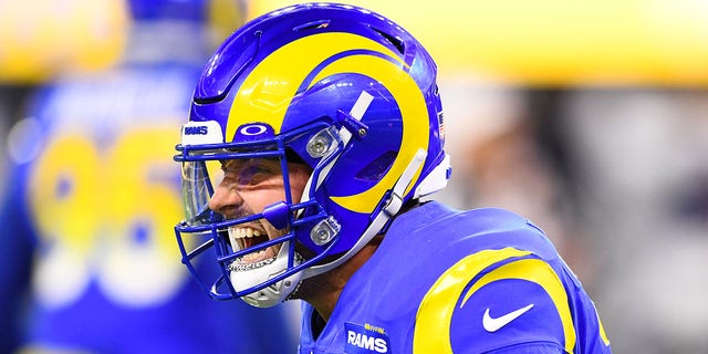 Los Angeles Rams quarterback Baker Mayfield (17) celebrates after throwing the game-winning touchdown pass during the NFL game between the Las Vegas Raiders and the Los Angeles Rams on December 8, 2022, at SoFi Stadium in Inglewood, California. 