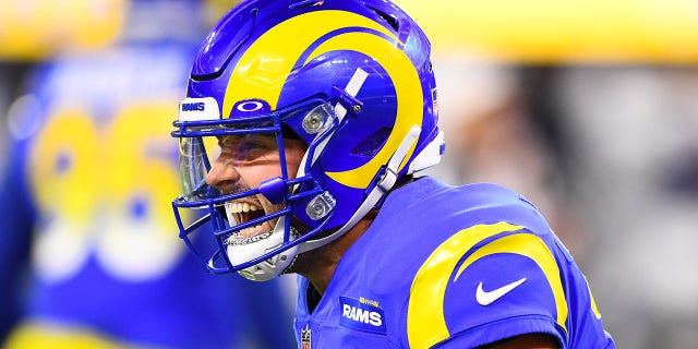 Los Angeles Rams quarterback Baker Mayfield (17) celebrates after throwing the game-winning touchdown pass during the NFL game between the Las Vegas Raiders and the Los Angeles Rams on December 8, 2022, at SoFi Stadium in Inglewood, California. 