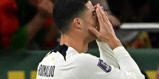 Portugal's forward #7 Cristiano Ronaldo reacts during the Qatar 2022 World Cup quarter-final football match between Morocco and Portugal at the Al-Thumama Stadium in Doha on December 10, 2022. 