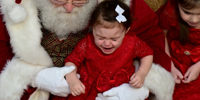 Some Santaland staff recommend parents intervene if their children are uncomfortable meeting Santa.