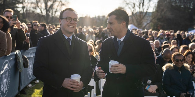 WASHINGTON, DC - DECEMBER 13: (L-R) Chasten Buttigieg and U.S. Transportation Secretary Pete Buttigieg attend a bill signing ceremony for the Respect for Marriage Act on the South Lawn of the White House December 13, 2022, in Washington, DC. The Respect for Marriage Act will codify same-sex and interracial marriages. 