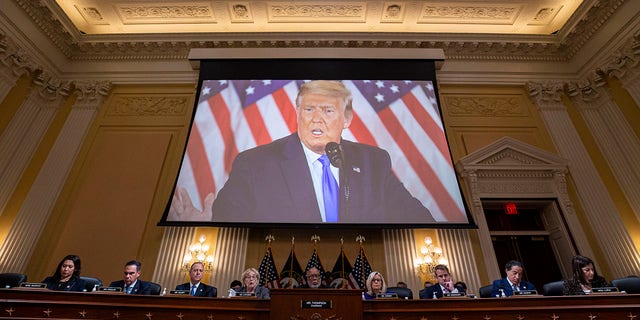 Former U.S. President Donald Trump is displayed on a screen during a meeting of the Select Committee to Investigate the January 6th Attack on the U.S. Capitol in the Canon House Office Building on Capitol Hill on Dec. 19, 2022, in Washington, DC.