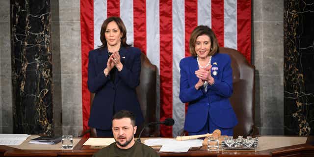 Ukraine's President Volodymyr Zelenskyy addresses the U.S. Congress as Vice President Kamala Harris, left, and House Speaker Nancy Pelosi (D-CA) applaud at the U.S. Capitol in Washington, D.C., on Dec. 21, 2022. 