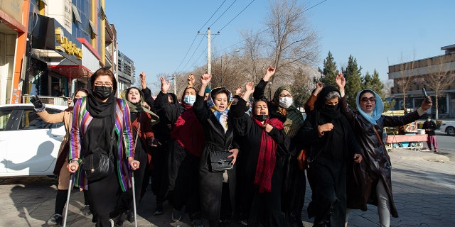 KABUL, AFGHANISTAN - DECEMBER 22:  Afghan women protest against new Taliban ban on women accessing University Education on December 22, 2022 in Kabul, Afghanistan.