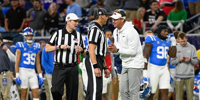 Mississippi Rebels head coach Lane Kiffin pleads his case with officials after Ole Miss was flagged for its second goal penalty of the game during the TaxAct Texas Bowl between the Texas Tech Red Raiders and Ole Miss Rebels at the NRG Stadium on December 28, 2022 in Houston.