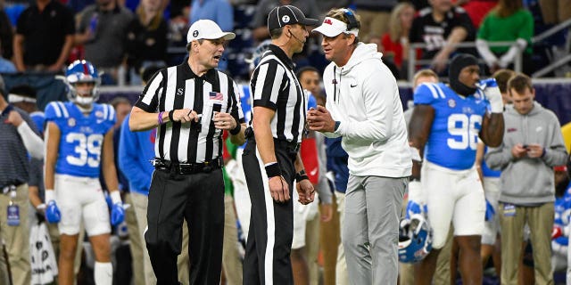 Mississippi Rebels head coach Lane Kiffin pleads his case with officials after Ole Miss was flagged for its second goal penalty of the game during the TaxAct Texas Bowl between the Texas Tech Red Raiders and Ole Miss Rebels at the NRG Stadium on December 28, 2022 in Houston.