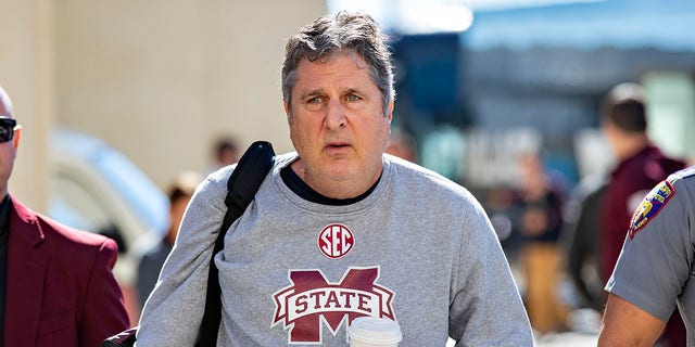 Mississippi State Bulldogs head coach Mike Leach arrives at the stadium before a game against the Arkansas Razorbacks on Nov. 6, 2021 in Fayetteville, Arkansas.