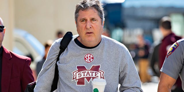 Head coach Mike Leach of the Mississippi State Bulldogs arrives at the stadium before a game against the Arkansas Razorbacks at Donald W. Reynolds Razorback Stadium Nov. 6, 2021, in Fayetteville, Ark. 