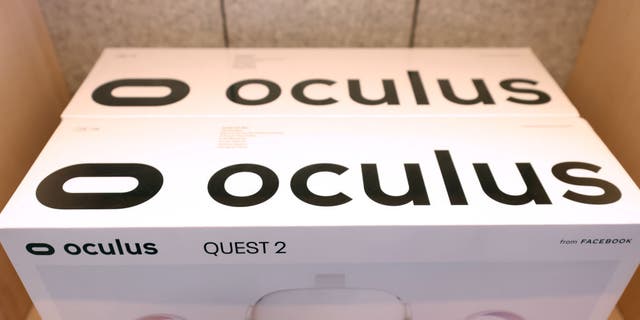 Oculus Quest 2 virtual reality headsets are displayed during a media preview of the new Meta Store on May 04, 2022 in Burlingame, California.