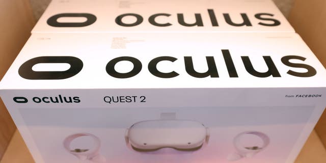 Oculus Quest 2 virtual reality headsets are displayed during a media preview of the new Meta Store on May 04, 2022 in Burlingame, California.