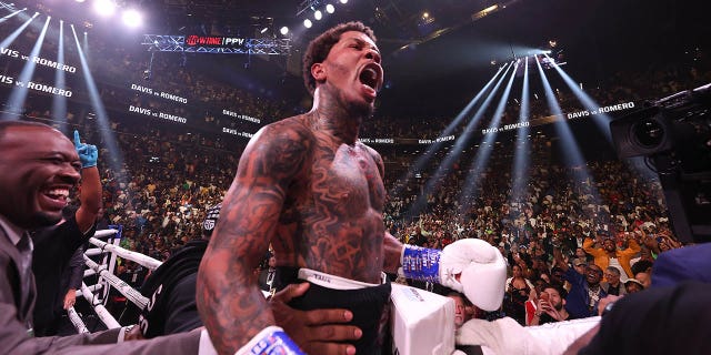 Gervonta Davis celebrates after knocking out Rolando Romero with a left hook in the sixth round during their fight for the WBA World lightweight title at Barclays Center on May 28, 2022 in Brooklyn, New York.
