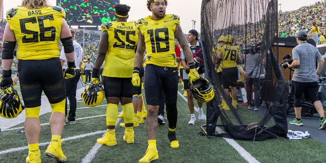 Cam McCormick, #18 of the Oregon Ducks, stands on the sidelines against the Eastern Washington Eagles at Autzen Stadium on September 10, 2022, in Eugene, Oregon.