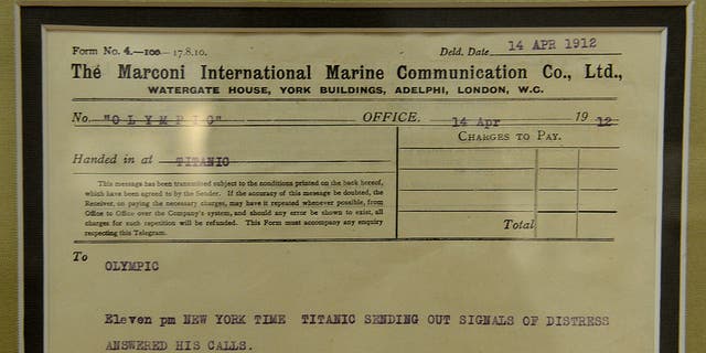 A Marconi message (radio message) from the Titanic to the Olympic ship is on display at Bonhams auction house in New York, April 12, 2012. Bonhams held an auction that month called "R.M.S. Titanic: 100 years of fact and fiction," featuring artifacts from the Titanic, documents related to the sinking of the ship, various memorabilias and Titanic-related movie props.  