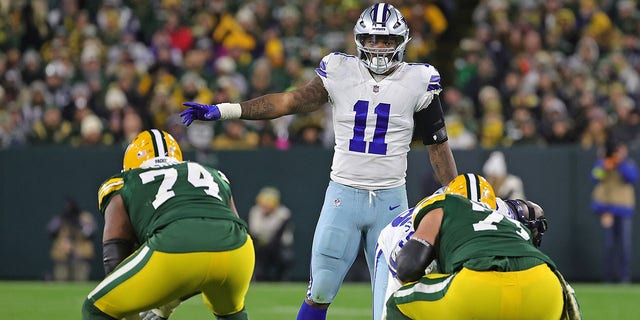 Micah Parsons, #11 of the Dallas Cowboys, anticipates a play during a game against the Green Bay Packers at Lambeau Field on Nov. 13, 2022 in Green Bay, Wisconsin. The Packers defeated the Cowboys 31-28 in overtime. 