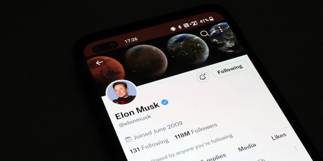 The Twitter account of Elon Musk is displayed on a smartphone on November 21, 2022.