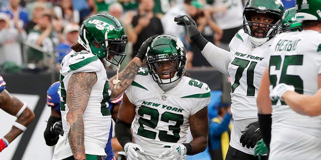 James Robinson (23) of the New York Jets celebrates his touchdown against the Buffalo Bills at MetLife Stadium Nov. 6, 2022, in East Rutherford, N.J. 