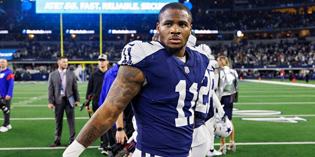 Micah Parsons, number 11 of the Dallas Cowboys, walks off the field after a game against the New York Giants at AT&T Stadium on November 24, 2022 in Arlington, Texas.  The Cowboys defeated the Giants 28-20. 