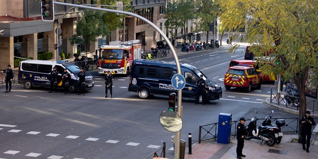 General view of a police device in the vicinity of the US Embassy in Madrid where a parcel bomb has been received, December 1, 2022, in Madrid, Spain. 