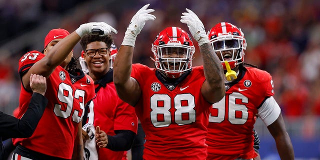 Jalen Carter #88 of the Georgia Bulldogs reacts after a defensive stop against the LSU Tigers during the second quarter  in the SEC Championship game at Mercedes-Benz Stadium on December 03, 2022 in Atlanta, Georgia. 