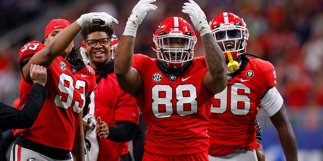Jalen Carter #88 of the Georgia Bulldogs reacts after a defensive stop against the LSU Tigers during the second quarter in the SEC Championship game at Mercedes-Benz Stadium on December 03, 2022 in Atlanta, Georgia.