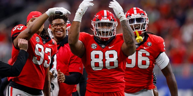 Jalen Carter #88 of the Georgia Bulldogs reacts after a defensive stop against the LSU Tigers during the second quarter  in the SEC Championship game at Mercedes-Benz Stadium on December 03, 2022 in Atlanta, Georgia. 