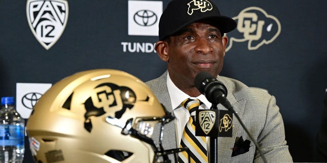 Deion Sanders, Colorado's new head football coach, takes questions in the Arrow Touchdown Club during a press conference Dec. 4, 2022, in Boulder, Colo.